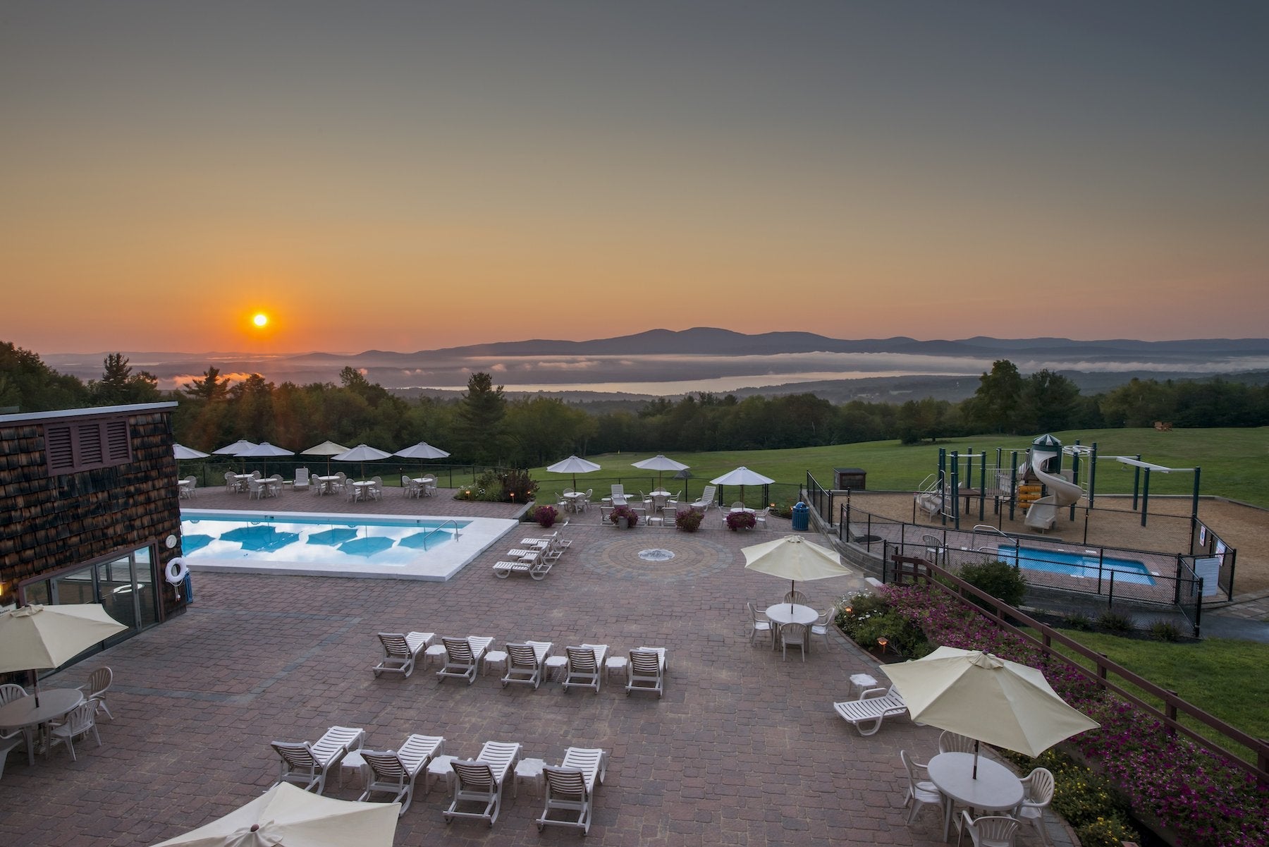 Sunrise over mountains and valley fog from the Steele Hill hilltop pool patio