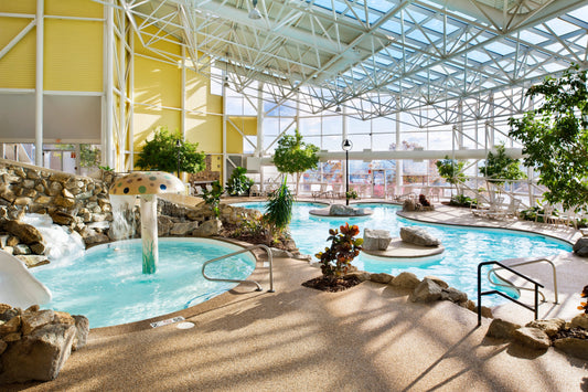 Steele Hill's indoor atrium pool with a mushroom fountain, waterslide and rock waterfall